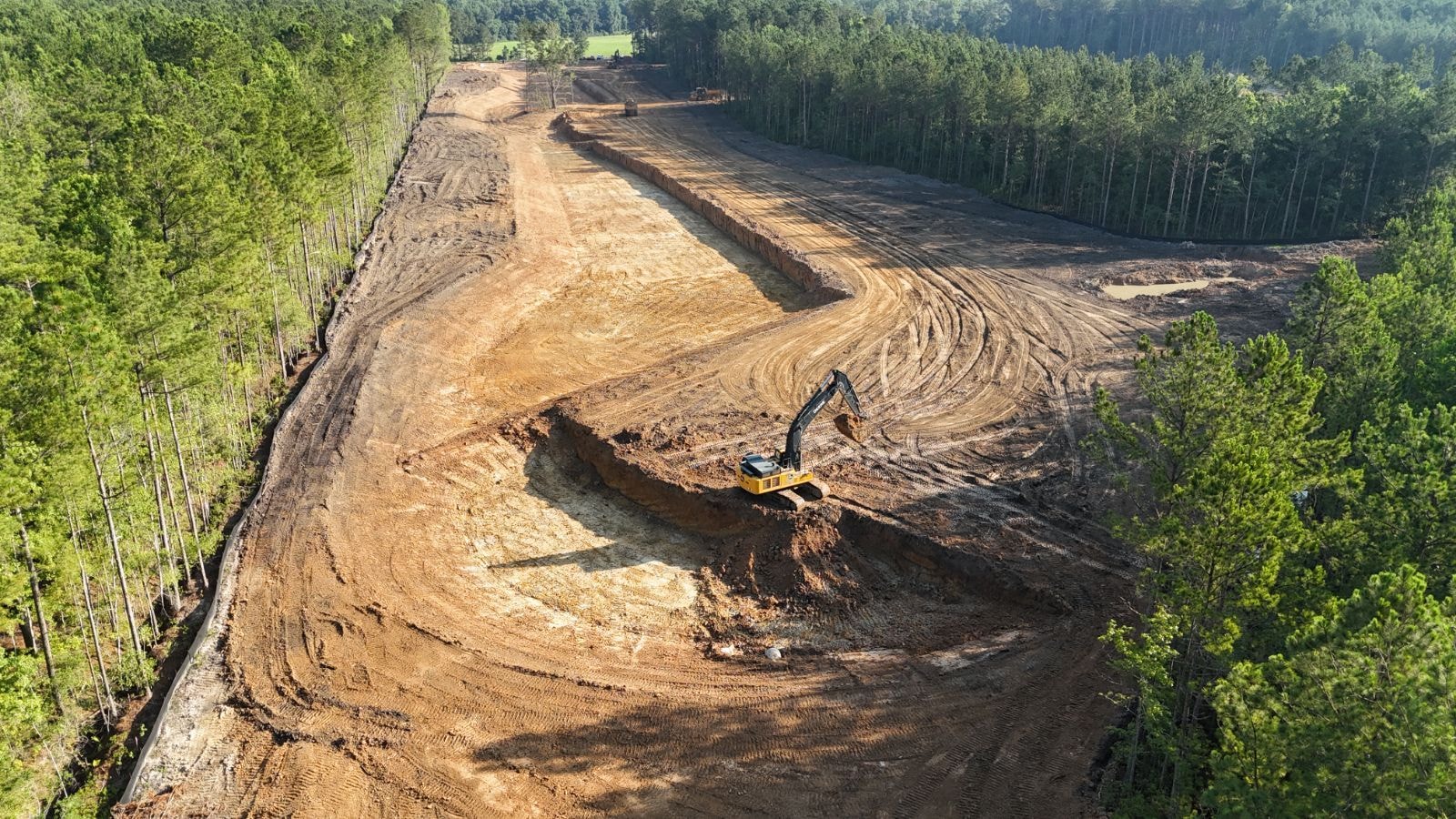 Aerial view of mass grading and land clearing